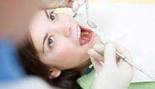 Woman taking a dental treatment