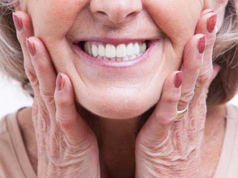 Elder woman having good teeth